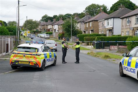 Four more people held over Bradford house fire which killed .